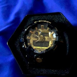 Casio G-Shock black and gold adjustable watch